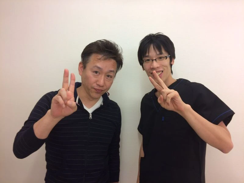 頭痛で来院された患者様と院長のツーショット写真